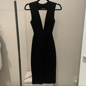 Lulu’s black midi dress. Deep v front cut. Open back. Size XS